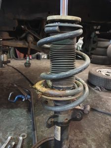 broken transit front coil spring repair